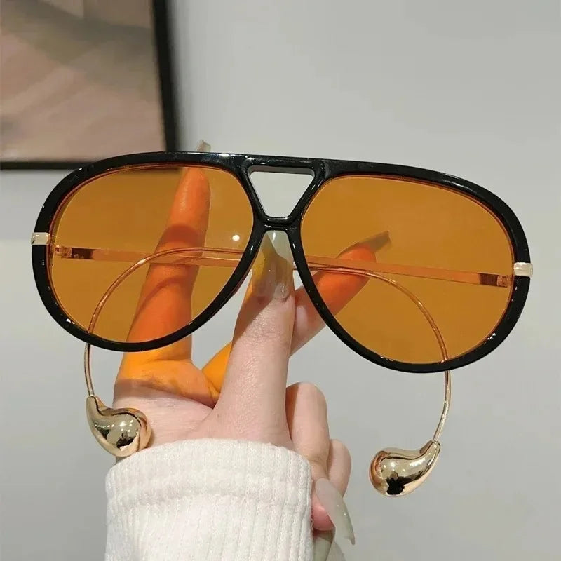 Oversized pilot sunglasses by HSF Marketplace with double bridge design, gradient lenses, and trendy metal frame for women.