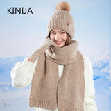Women's wool knit winter scarf, gloves, and cap set in a warm, cozy design.