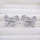 Romantic bowknot women’s stud earrings with full-paved shiny crystal zircon, delicate fashion jewelry by HSF Marketplace