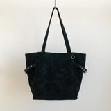 Black Rivet Design women's shoulder handbag with large capacity, elegant office style, featuring brand details and spacious interior.