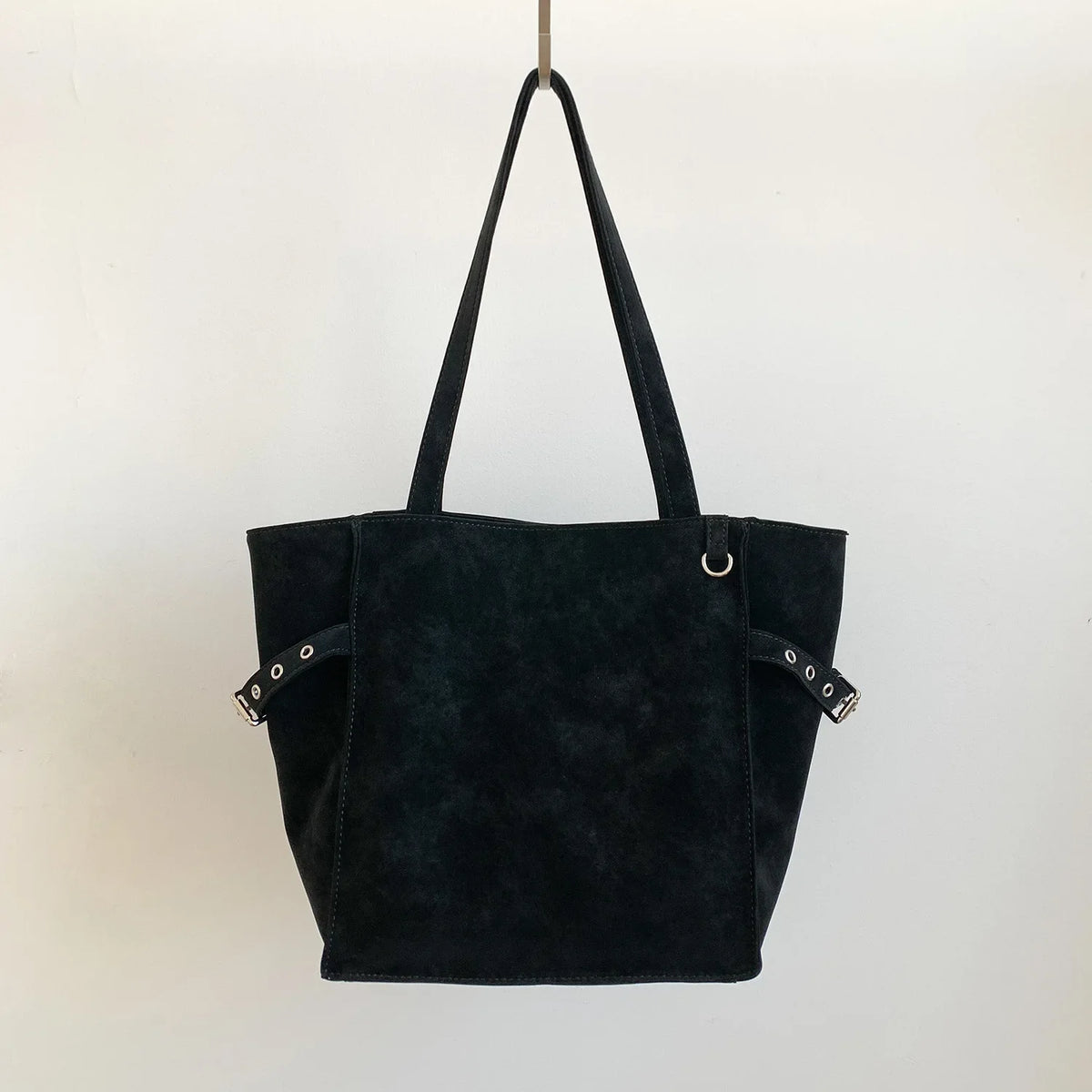 Black Rivet Design women's shoulder handbag with large capacity, elegant office style, featuring brand details and spacious interior.
