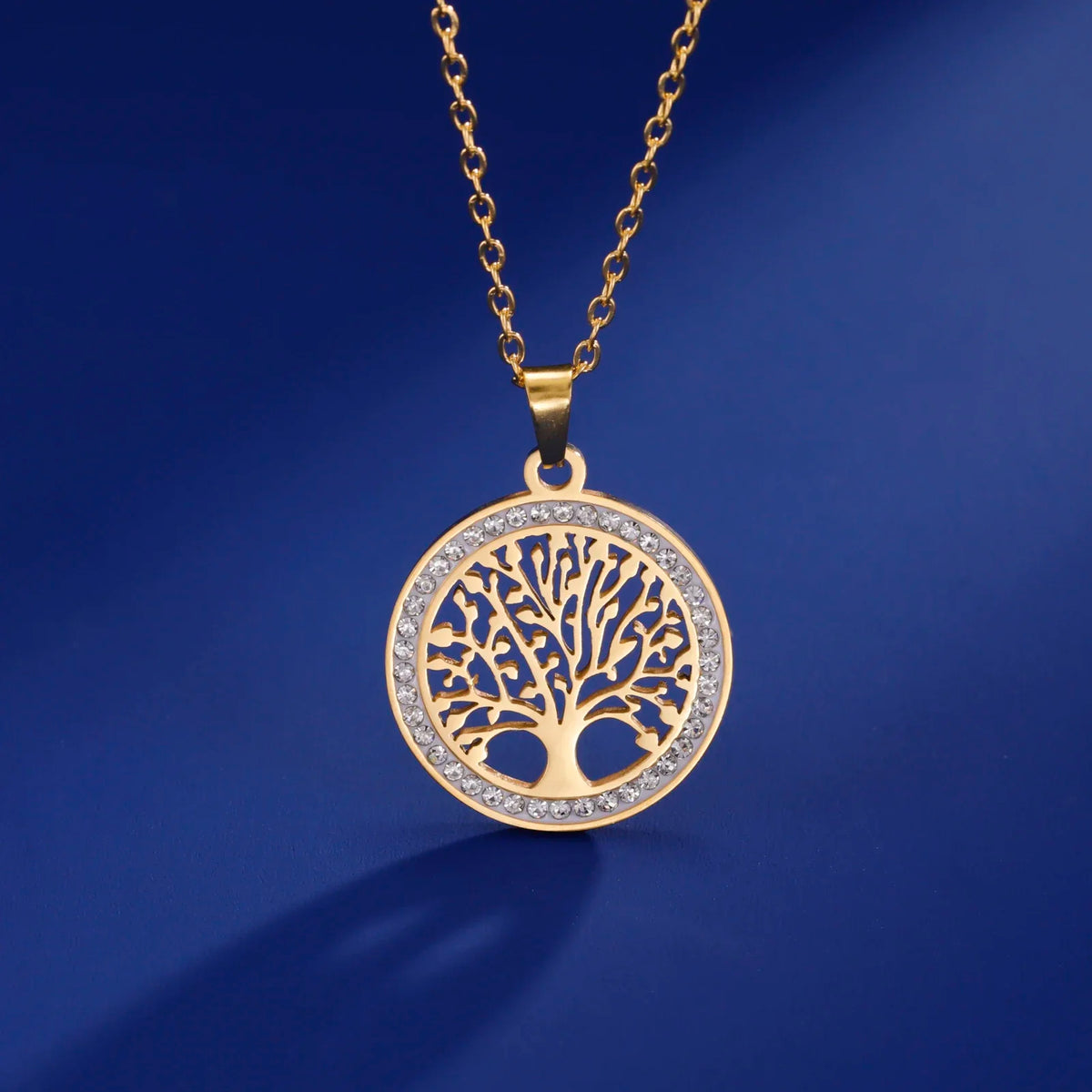 Stainless steel Tree of Life pendant necklace for women with zircon border, hypoallergenic, waterproof, adjustable chain jewelry.