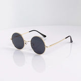 Retro vintage round polarized sunglasses for men and women with black lenses, alloy metal frame, UV400 protection by HSF Marketplace.