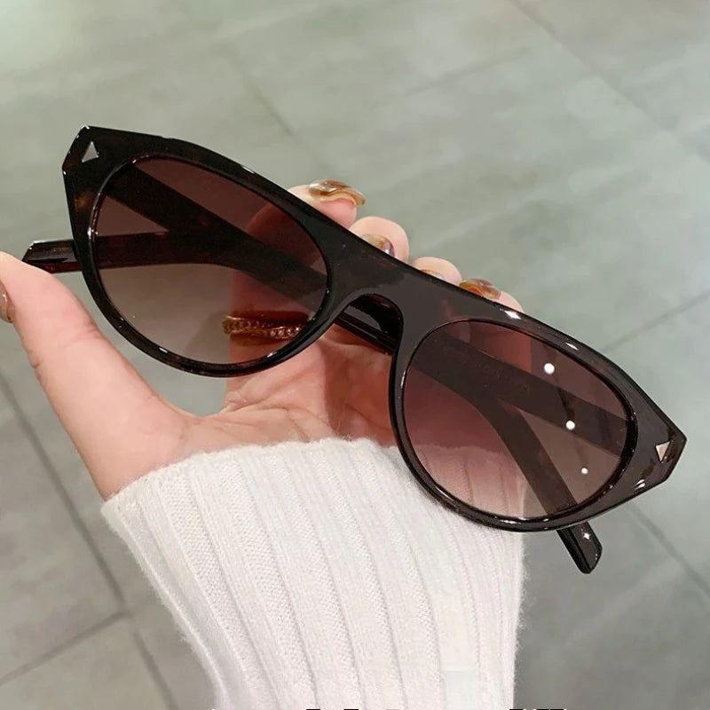 Retro small oval sunglasses for women and men, trendy chic cat eye fashion sunnies with narrow frames by HSF Marketplace.