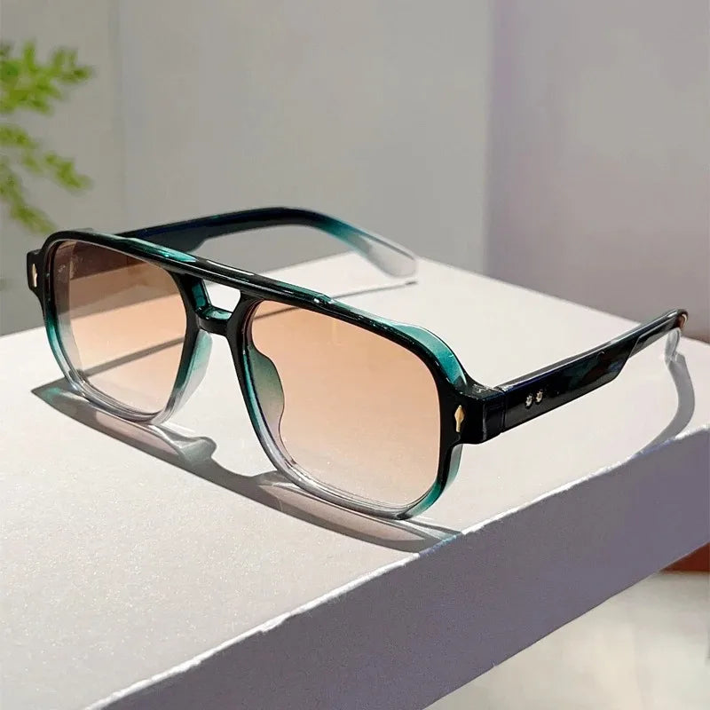 Vintage double bridges square sunglasses with rivet details, ocean lens, UV400 protection, perfect for women’s trendy travel style.