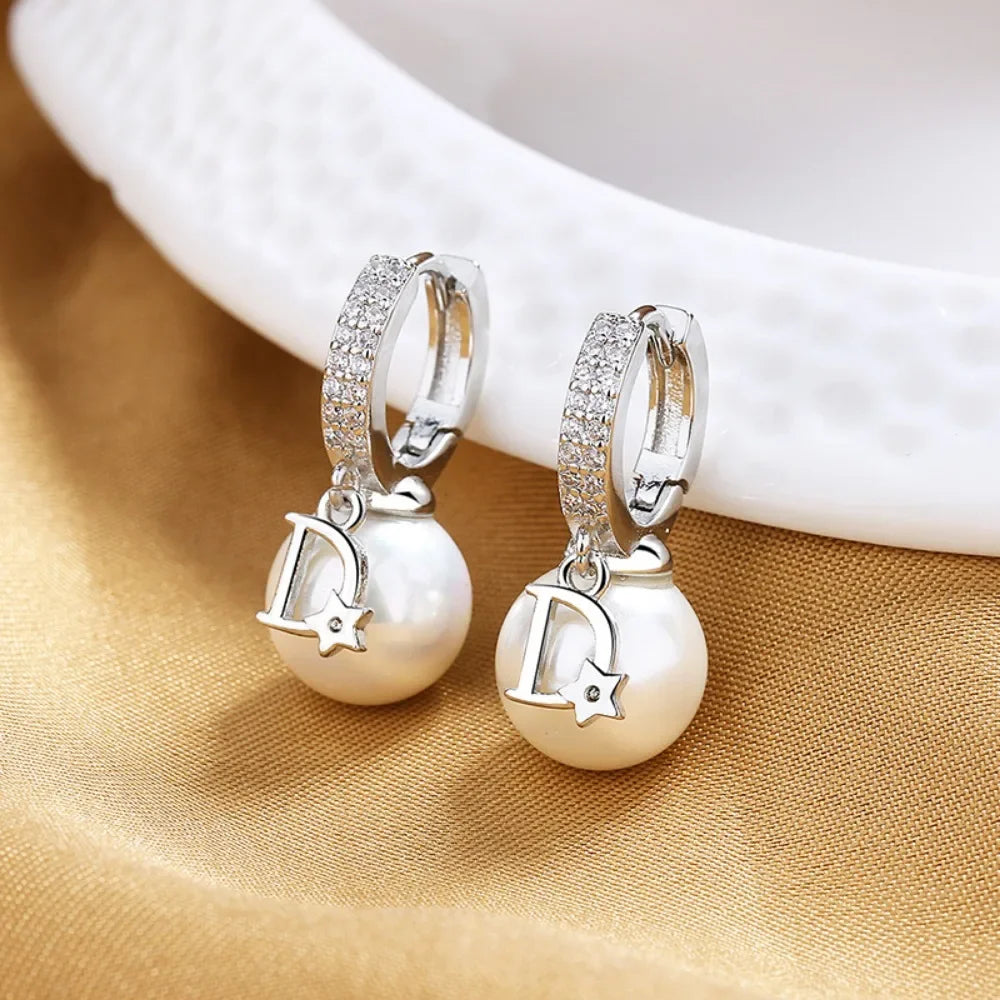 Stainless steel dangle earrings with pearl and zircon accents for women by HSF Marketplace