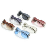 Y2K rimless sunglasses for women with snake ray metal legs, gradient lenses, wrap-around punk style, luxury eyewear by HSF Marketplace