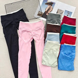 Women's high-waisted peach butt yoga pants by HSF Marketplace, shown in a fitted design.