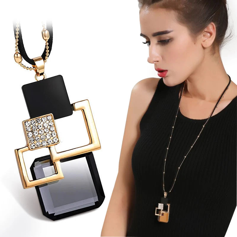 Long geometric pendant necklace for women, HSF Marketplace jewelry, featuring a modern chain design and statement style.