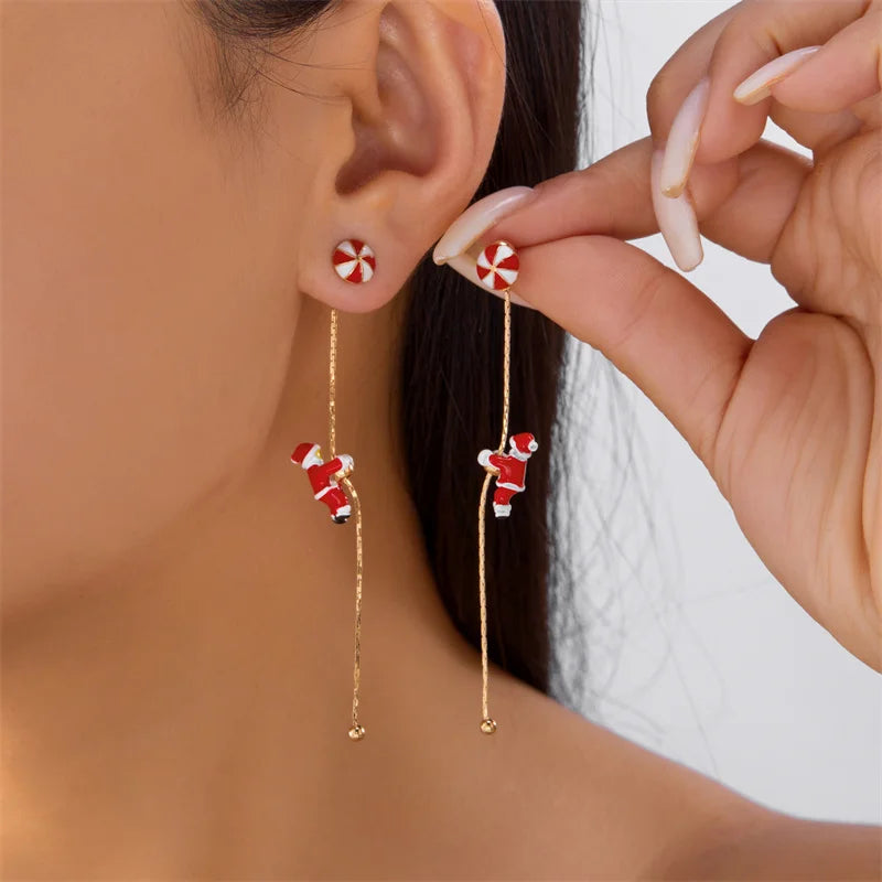 Moving Santa Claus tassel dangle earrings for festive style by HSF Marketplace