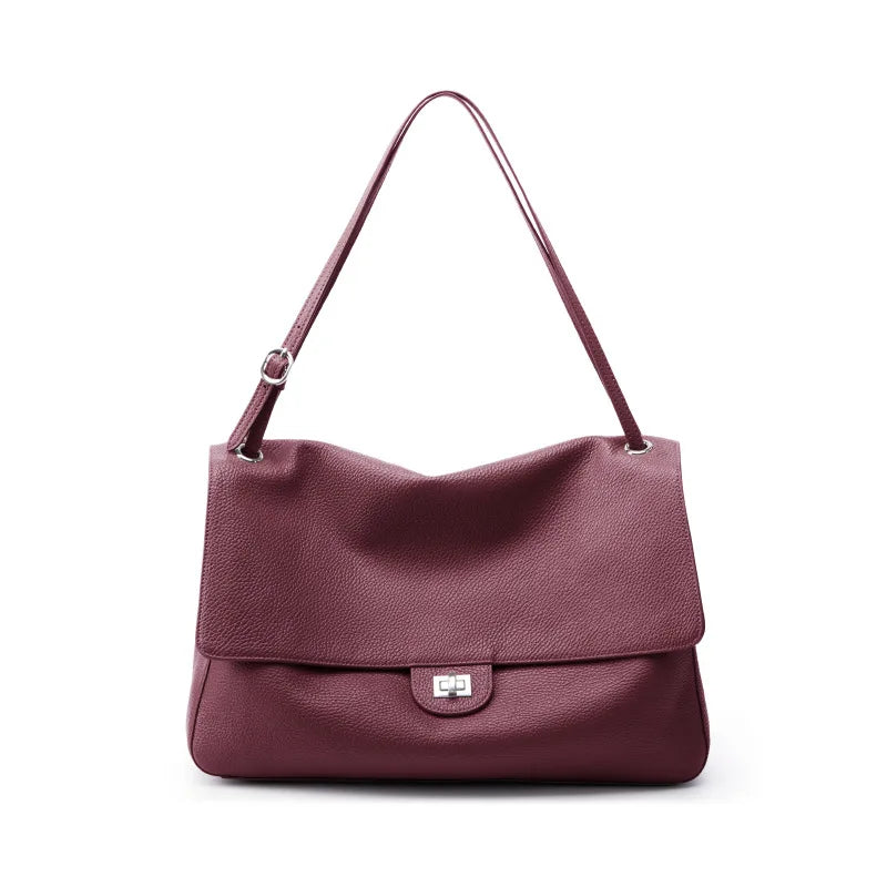 Women's luxury leather handbag with large capacity, soft wear-resistant texture, trendy travel design, and simple high-end style.
