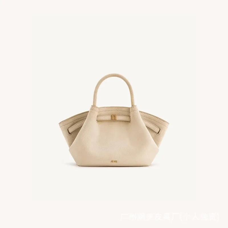 JW PEI Dumpling Bag, stylish genuine leather crossbody handbag for women in a compact curved design