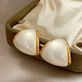 Gold-plated minimalist triangle imitation pearl earrings with white pearl studs for women