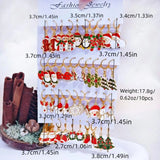 HSF Marketplace festive Christmas dangle earrings featuring snowman and elk charms