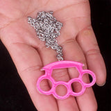 Resin imitation four-finger boxing glove pendant necklace with metal chain, fashion women's jewelry accessory.