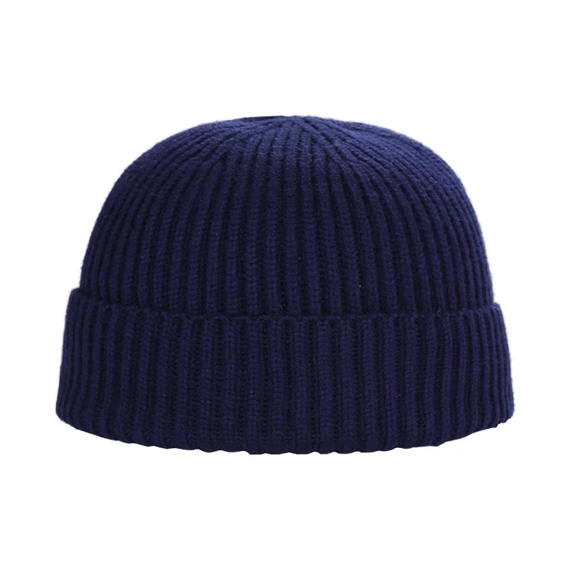 Warm knitted melon beanie hat for men and women, winter women's hat in soft textured fabric