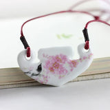 Women’s ceramic fashion necklace with pendant, stylish jewelry for women, HSF Marketplace wholesale jewelry image.