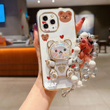 Pearl strap Love Bear phone holder case for iPhone, featuring a cute bear design and beaded wrist strap