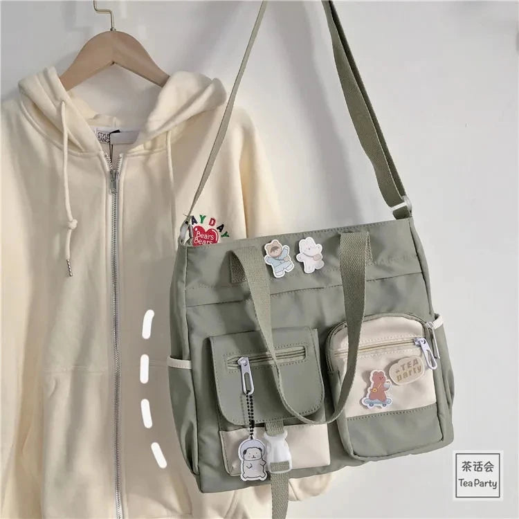 Waterproof canvas women's handbag with shoulder strap, nylon tote, and crossbody style, featuring Oxford fabric and spacious satchel design.