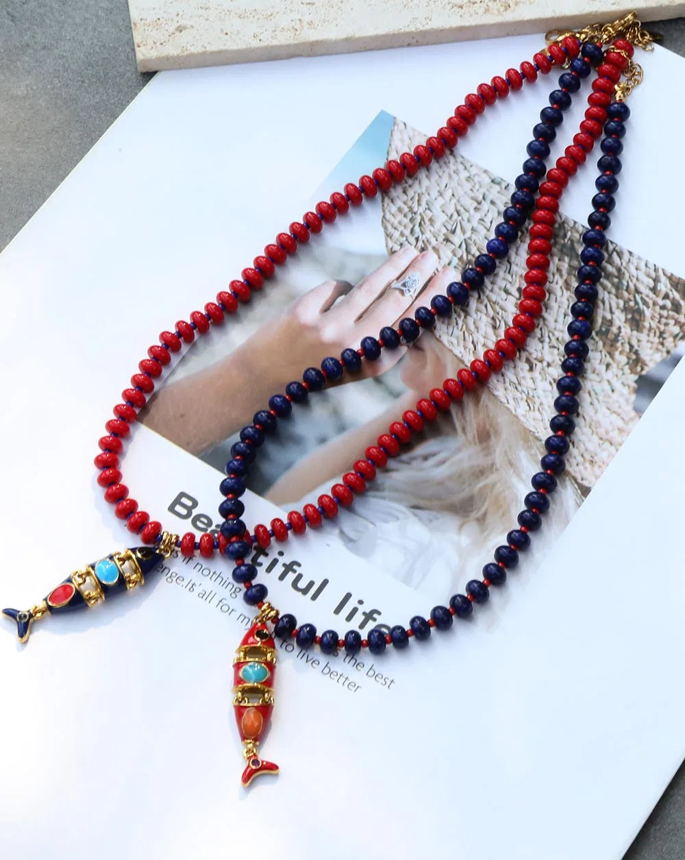Red and blue beaded necklace with multi-layer fish pendant, natural stone beads, stainless steel accents, jewelry by HSF Marketplace