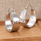 Silver plated hammered hoop earrings for women by HSF Marketplace