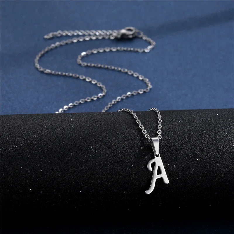 Shiny stainless steel initial letter pendant necklace for women, featuring a simple chain choker style jewelry.