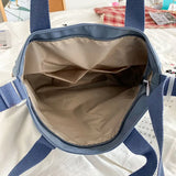 Waterproof canvas women's handbag by HSF Marketplace featuring shoulder, tote, and crossbody styles in nylon and Oxford fabric.