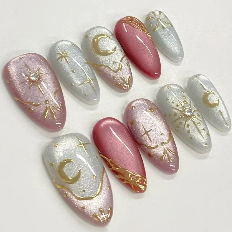 24-piece Y2K star press-on false nails with gradient blue French tips and gold moon designs in a sweet almond shape