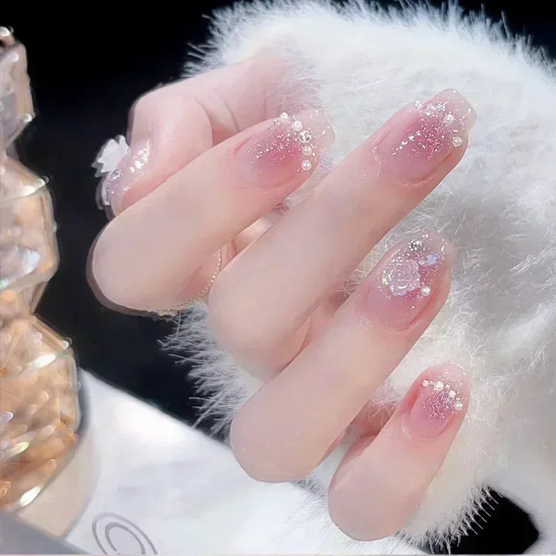 24pcs cute girly short square false nails with white French tips, glitter stars, rhinestones, cat eye, and bow art