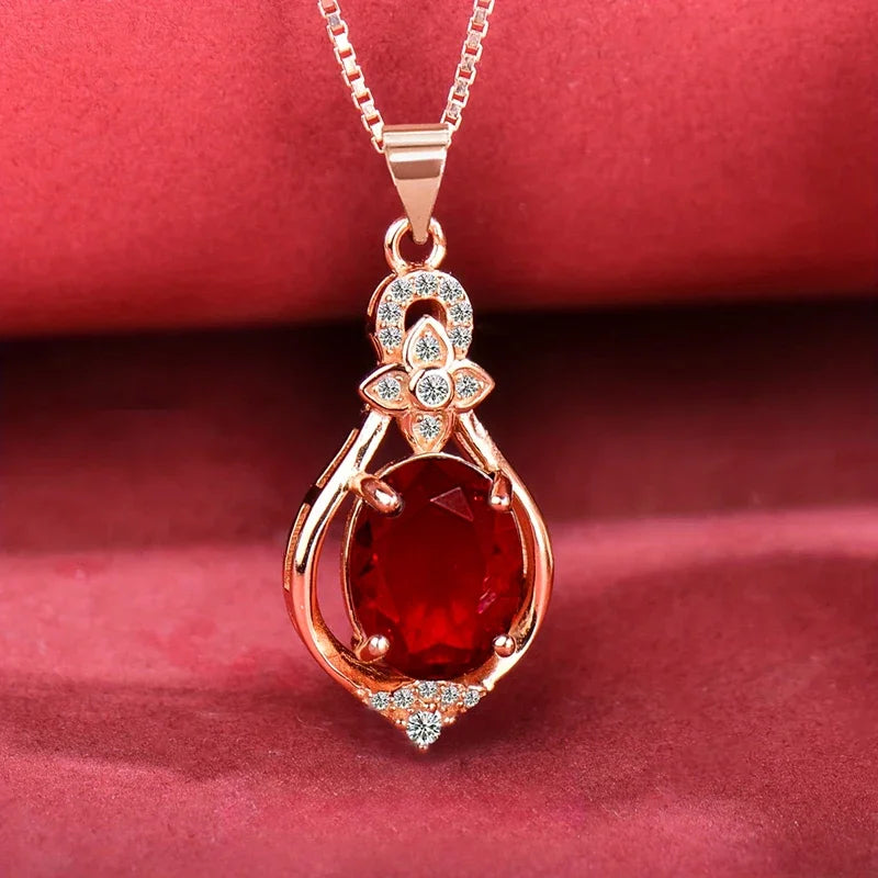 Huitan Fashion red cubic zirconia pendant necklace with sparkling brilliance, stylish jewelry for women, elegant engagement accessory