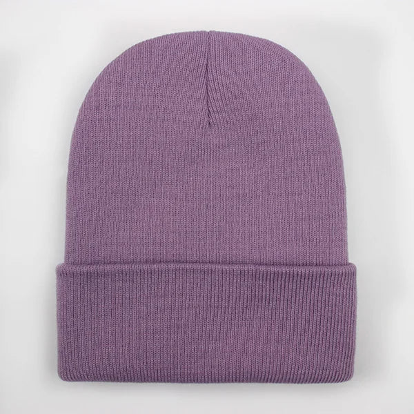 Unisex soft knitted winter beanie hat in a women's style, available in 24 colors