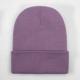Unisex soft knitted winter beanie hat in a women's style, available in 24 colors