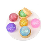 2026 new Decompression toy glitter colored bun shaped venting ball, dumping bun squeezing decompression ball