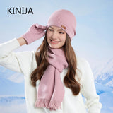 Women's warm woolen hat, scarf and gloves set in a coordinated winter accessories style