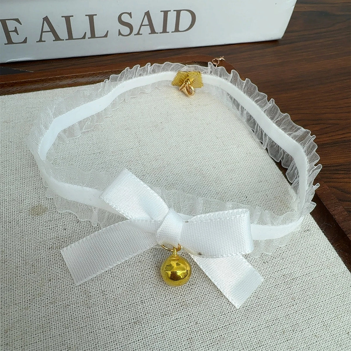 Women's gothic lace collar choker necklace with bow and small bell pendant, stylish fashion jewelry from HSF Marketplace.