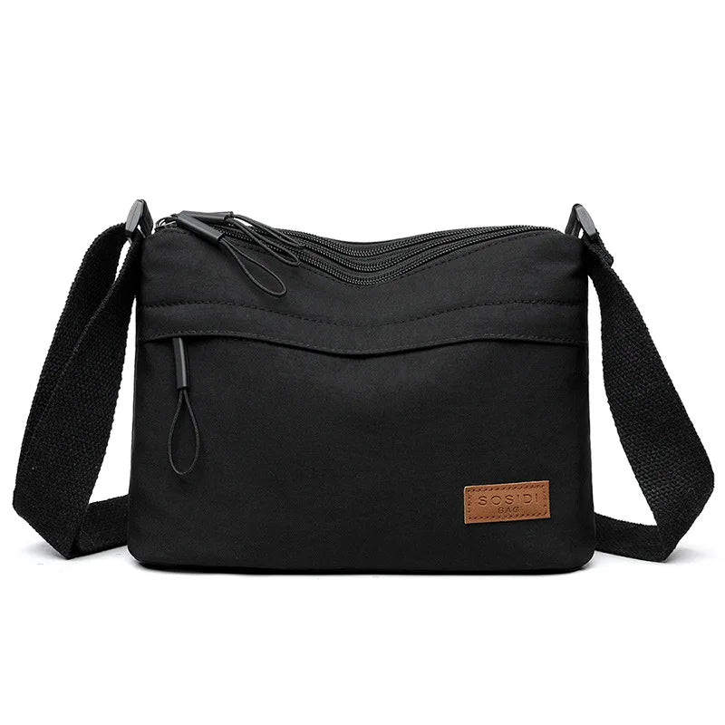 High-capacity HSF Marketplace shoulder crossbody bag for women with three main pockets, canvas design, ideal for shopping and moms.