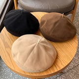 Women's luxurious woolen beret hat in a classic autumn and winter style by HSF Marketplace