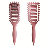 Hollow boar bristle curling styling brush from HSF Marketplace for detangling, shaping, and defining curls in hair.