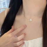 Elegant zircon cherry blossom necklace for women featuring a delicate flower choker design, perfect for fashion and special occasions.