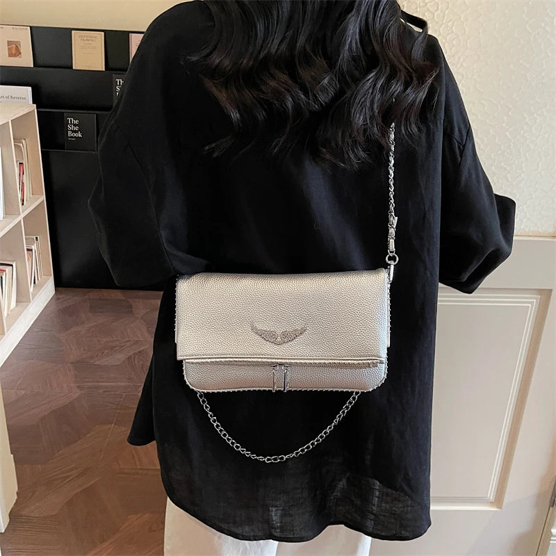 Small square crossbody bag for women by HSF Marketplace with a retro chain design