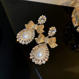 Elegant vintage gold bowknot dangle earrings for women by HSF Marketplace