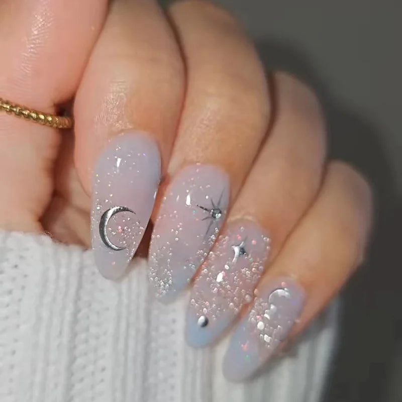 24-piece Y2K star press-on false nails with gradient blue French tips and gold moon designs, almond shape