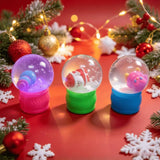 Holidays-themed Christmas snow globe squishy sensory toy from HSF Marketplace, featuring a festive snow scene inside a soft, squeezable globe.