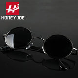 Retro vintage round polarized sunglasses for men and women with black lenses, alloy metal frame, UV400 protection, stylish designer eyewear