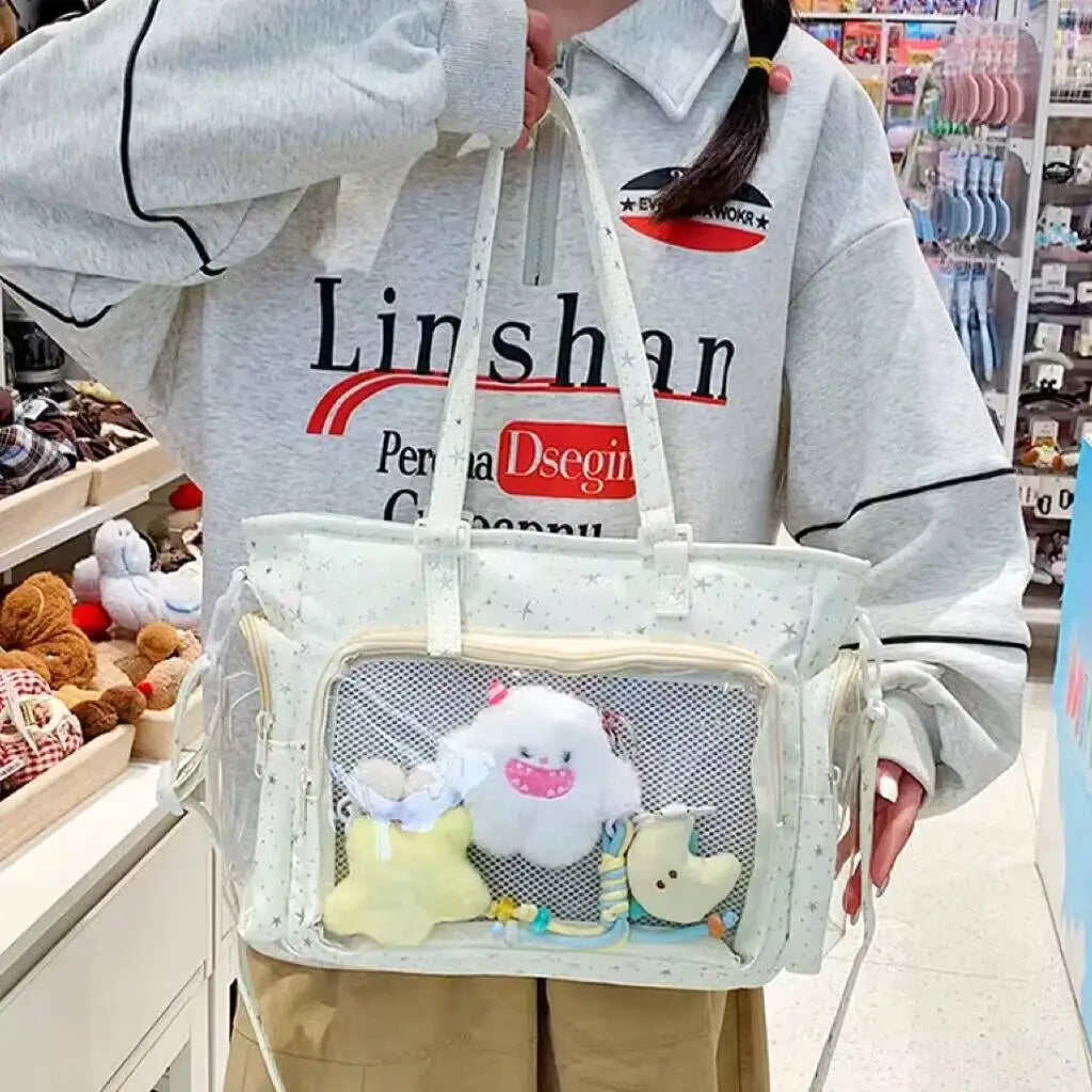 Cute Japanese Y2K-style Ita shoulder bag with transparent design, large capacity, casual crossbody purse for girls and lolita fashion.