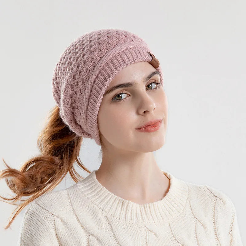Women's HSF beanie with ponytail hole, ear flaps, fleece lining, and slouchy winter hat design