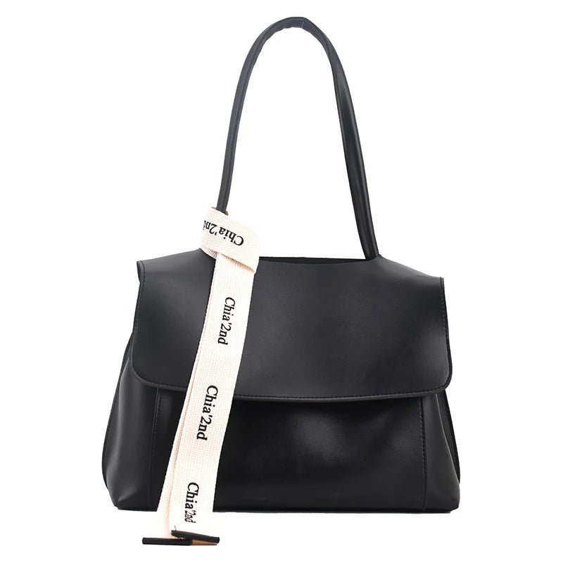 Large capacity women's tote bag with high-quality PU leather, stylish shoulder handbag with luxury design and fashionable details.