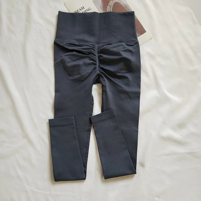 Women's high-waisted seamless leggings with peach butt-lifting fit, quick-dry fabric, and slim silhouette by HSF Marketplace