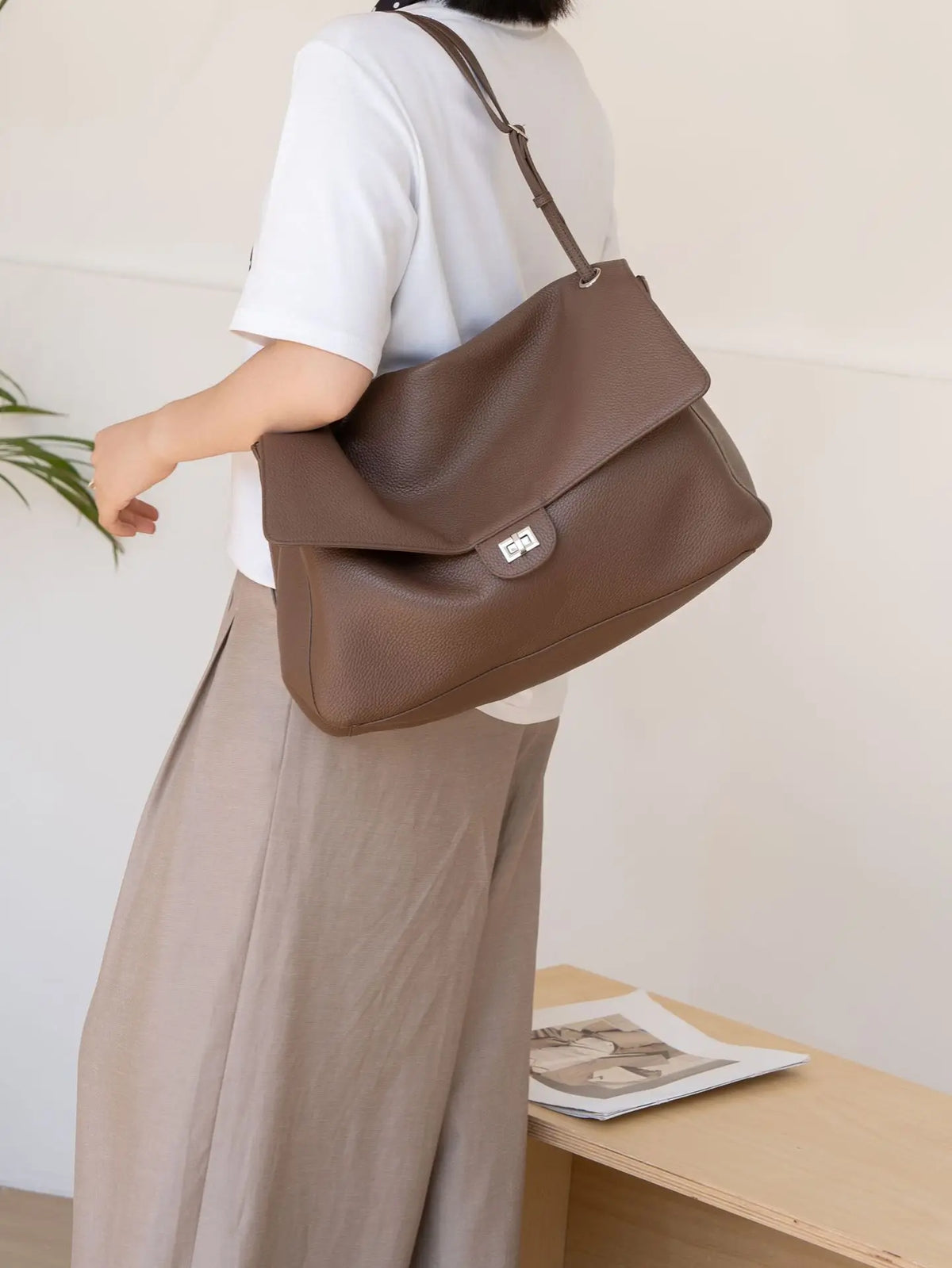 Women's luxury leather handbag from HSF Marketplace, large capacity, soft wear-resistant texture, trendy travel purse with simple design.