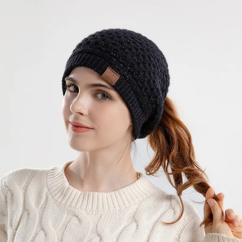 Women's HSF Marketplace beanie with ponytail hole, ear flaps, fleece lining, and slouchy winter cap design
